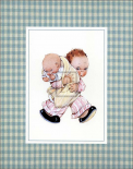 Boy Holding Baby